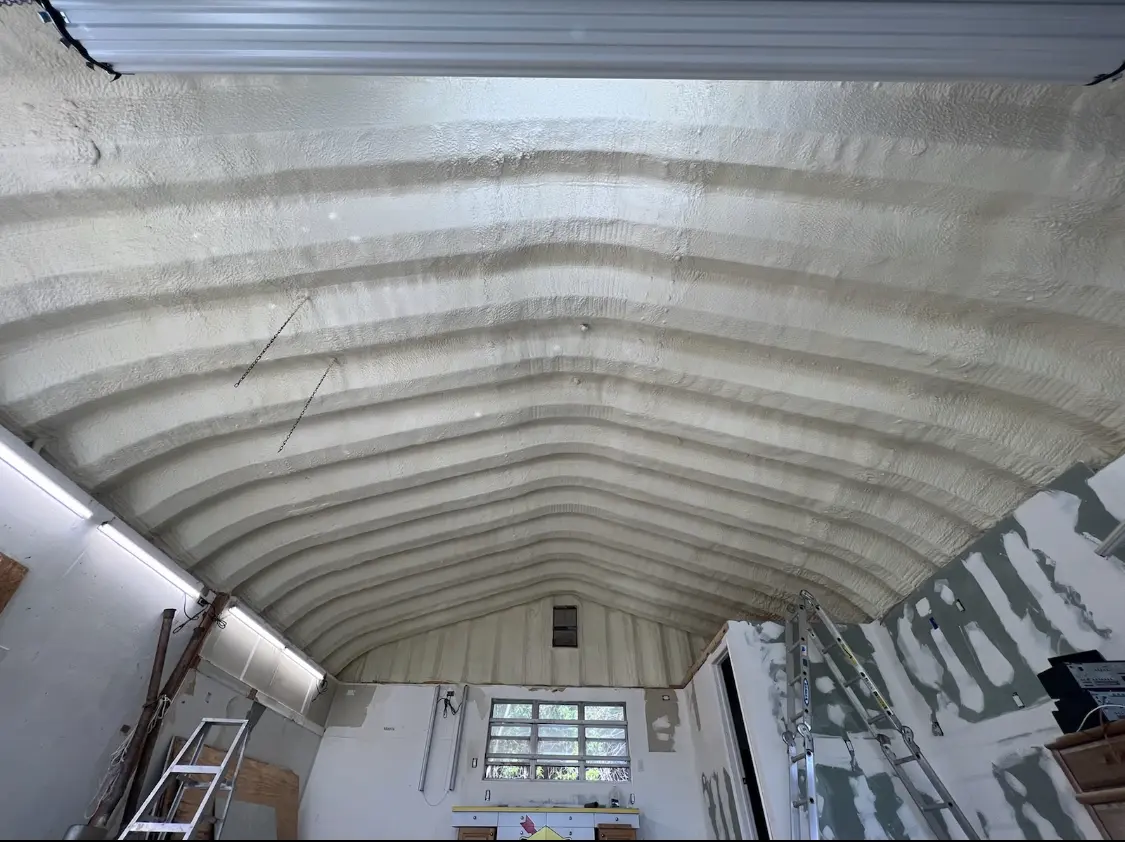 Spray polyurethane foam applied to the underside of a metal roof deck in Haverstraw